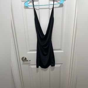 Low cut plunge dress with a low back